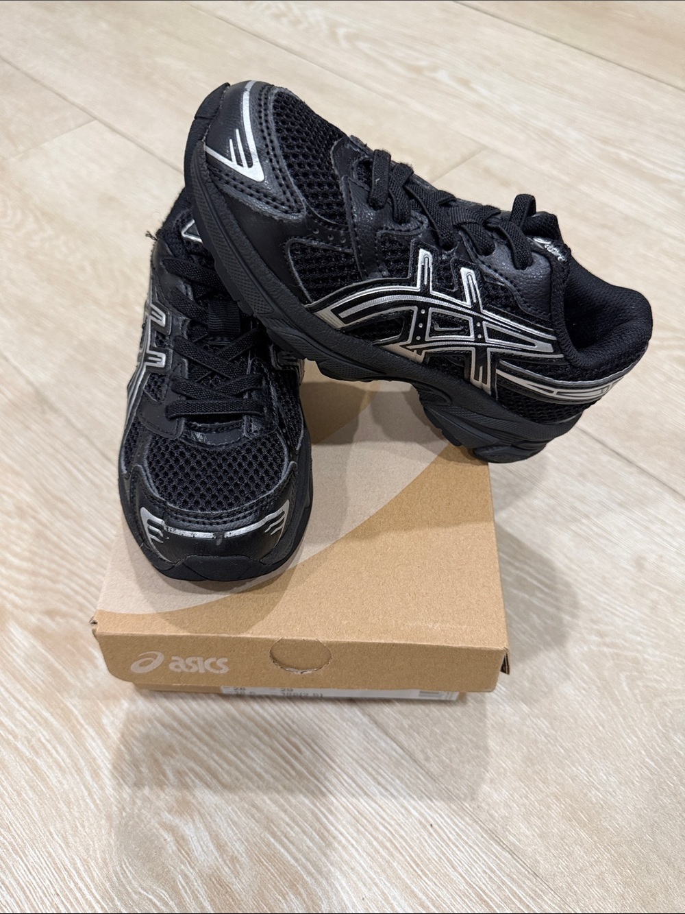 Asics Gel-1130 PS Kids Black Sneakers with Silver Accents - no lace slip on.